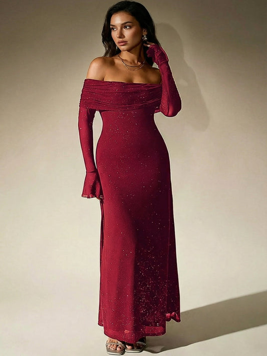 Woman wearing a burgundy off-shoulder gown with long sleeves on a beige background